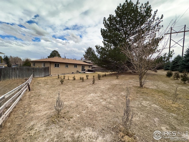 view of yard with fence