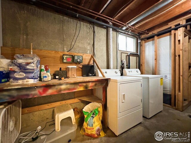 basement featuring separate washer and dryer