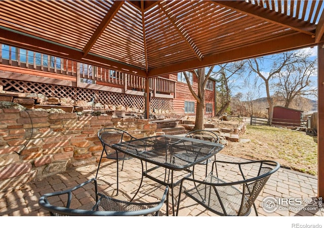 view of patio / terrace with fence and outdoor dining area