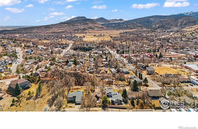 birds eye view of property featuring a residential view and a mountain view