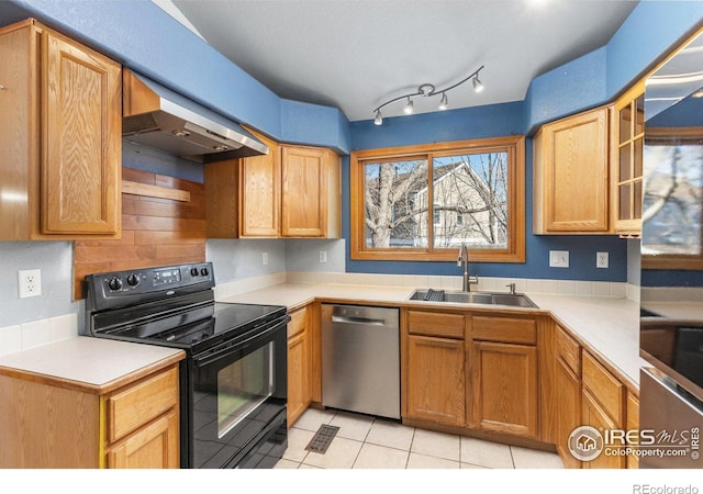 kitchen featuring light countertops, a sink, black range with electric cooktop, dishwasher, and extractor fan