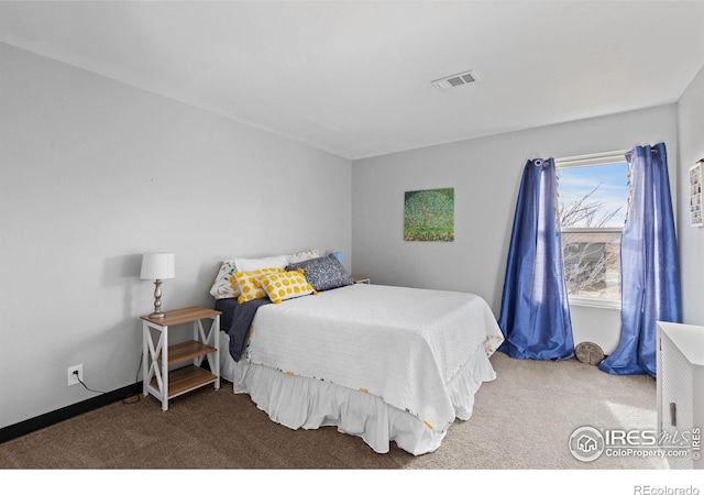 bedroom featuring carpet, visible vents, and baseboards