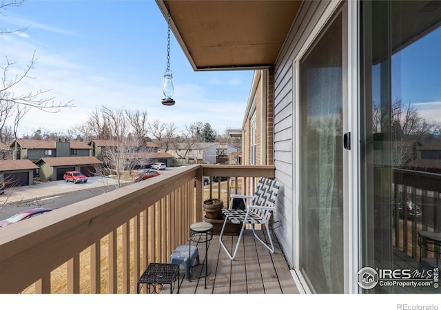 balcony featuring a residential view