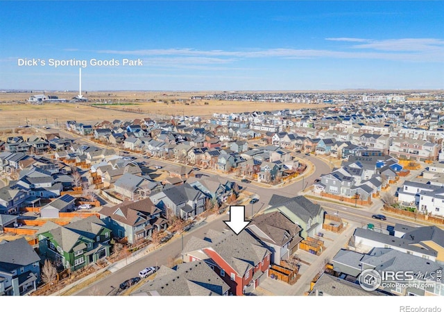 birds eye view of property with a residential view