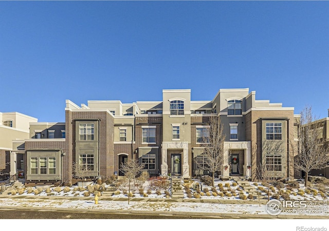 view of snow covered building