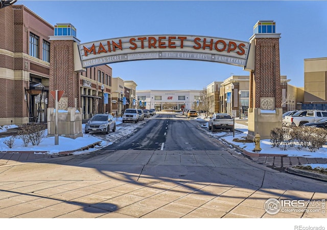 view of road with curbs, sidewalks, and a residential view