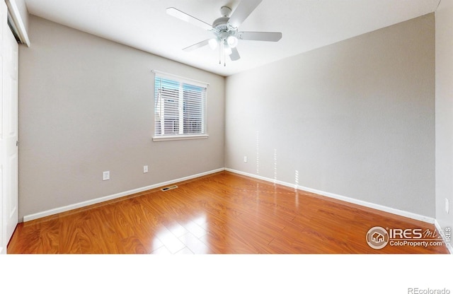 7145 Brittany Dr, Fort Collins, CO 80525 - spare room with ceiling fan, baseboards, and wood finished floors