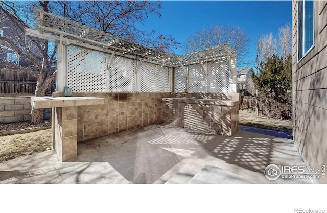 7145 Brittany Dr, Fort Collins, CO 80525 - view of patio with fence