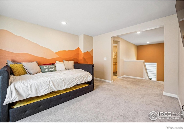 carpeted bedroom featuring recessed lighting and baseboards