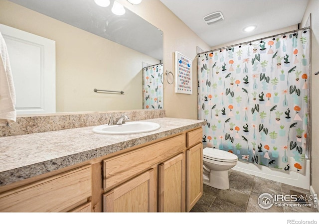 full bathroom featuring visible vents, vanity, shower / bath combination with curtain, and toilet