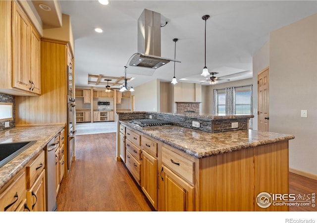 kitchen featuring island range hood, ceiling fan, open floor plan, dark wood-style flooring, and a center island