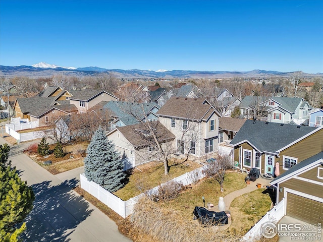 aerial view with a residential view and a mountain view