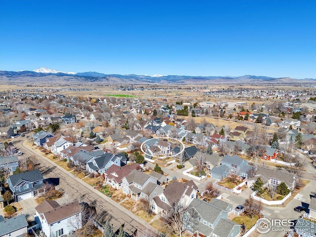 aerial view featuring a mountain view and a residential view