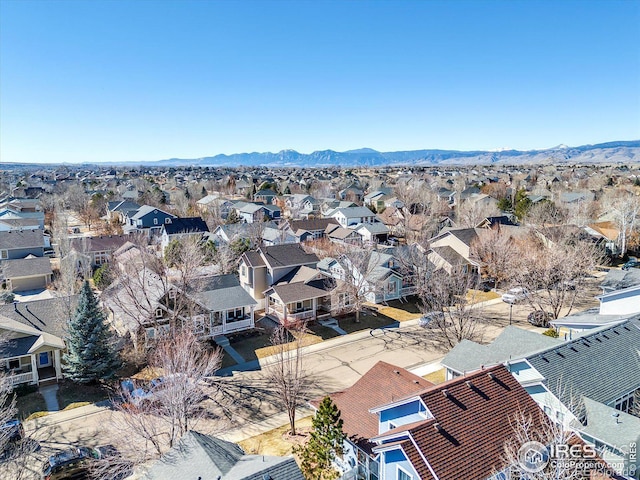 bird's eye view featuring a residential view and a mountain view