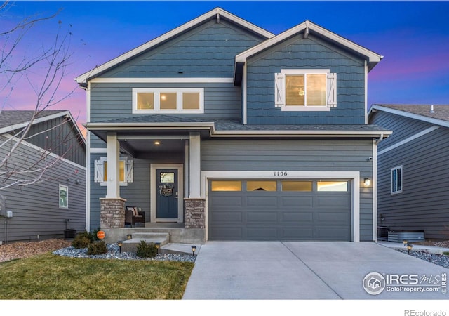 craftsman-style home featuring concrete driveway, an attached garage, and cooling unit