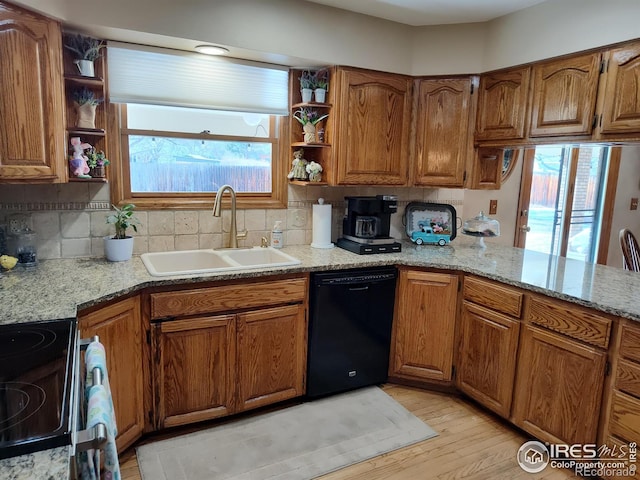 kitchen featuring black dishwasher, a sink, stainless steel electric range, and open shelves