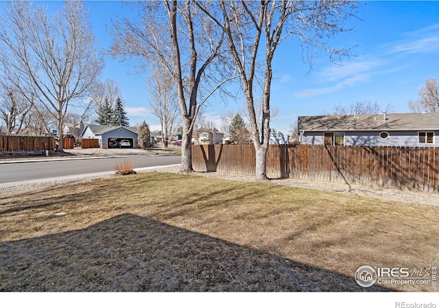 view of yard with fence