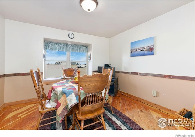 dining room featuring hardwood / wood-style flooring