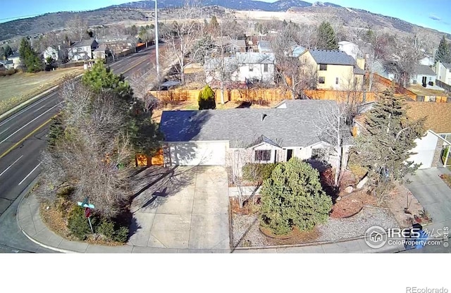 aerial view with a mountain view and a residential view