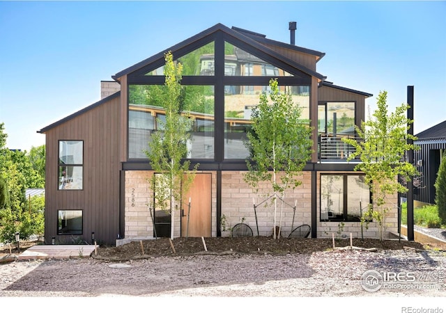 2586 3rd St, Boulder, CO 80304 - contemporary house featuring a chimney