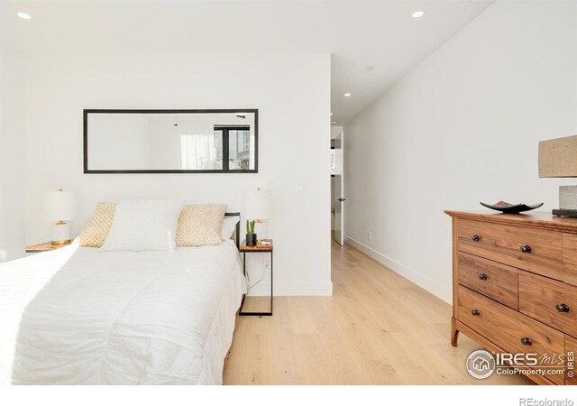 2586 3rd St, Boulder, CO 80304 - bedroom with light wood-type flooring, recessed lighting, and baseboards