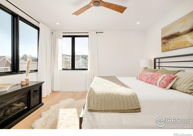 2586 3rd St, Boulder, CO 80304 - bedroom featuring wood finished floors, recessed lighting, and a ceiling fan