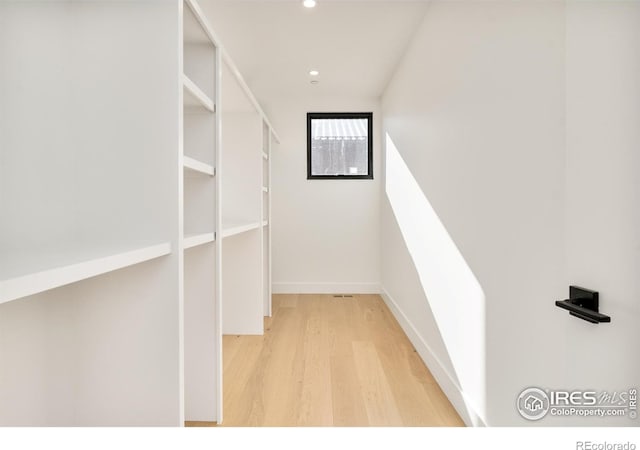 2586 3rd St, Boulder, CO 80304 - walk in closet featuring wood finished floors
