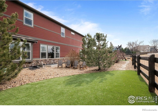 view of yard with fence