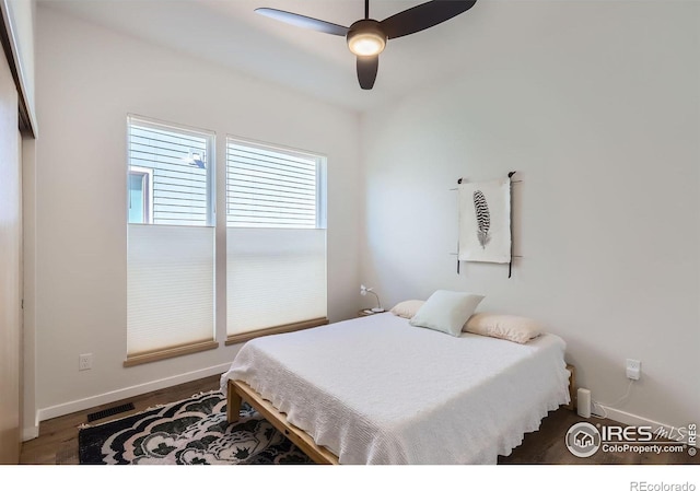 5626 Four Leaf Dr, Longmont, CO 80503 - bedroom featuring baseboards, wood finished floors, and a ceiling fan