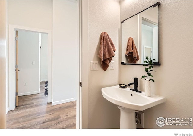 5626 Four Leaf Dr, Longmont, CO 80503 - bathroom featuring wood finished floors