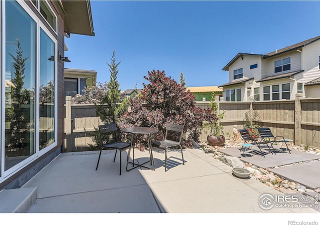 5626 Four Leaf Dr, Longmont, CO 80503 - fenced backyard featuring a patio