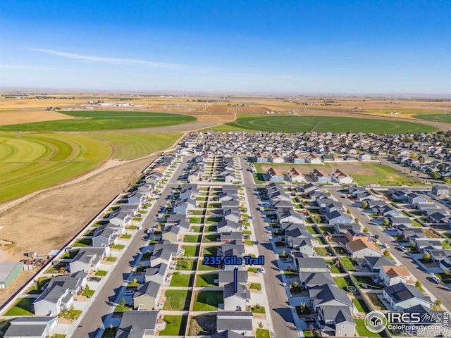 drone / aerial view featuring a residential view and view of golf course