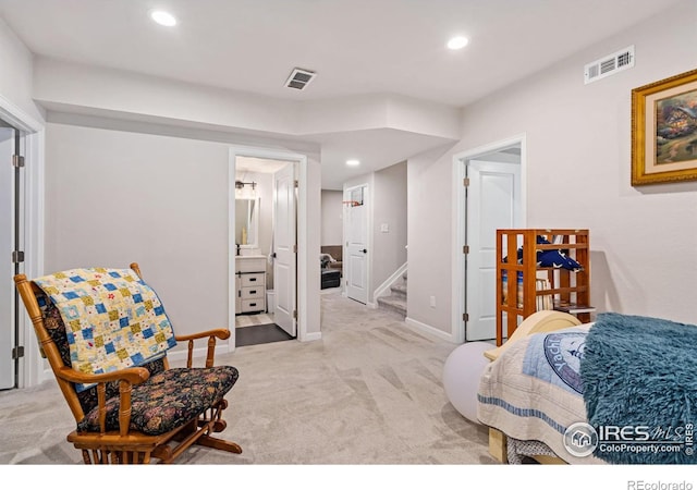 interior space featuring baseboards, visible vents, ensuite bathroom, and recessed lighting