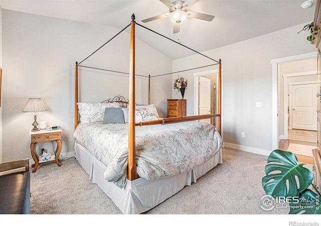 carpeted bedroom featuring ceiling fan, baseboards, and vaulted ceiling