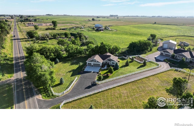 birds eye view of property featuring a rural view