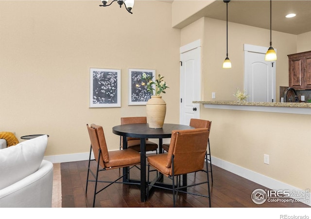 5850 Dripping Rock Ln Unit D201, Fort Collins, CO 80528 - dining space featuring dark wood-type flooring, recessed lighting, and baseboards