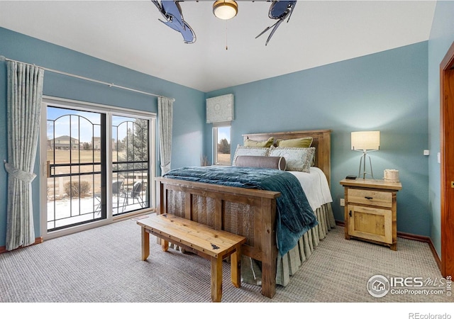 bedroom with access to exterior, baseboards, and light colored carpet