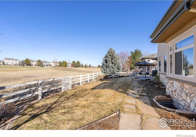 view of yard with fence