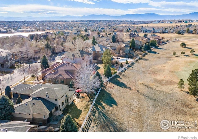 bird's eye view featuring a residential view and a mountain view