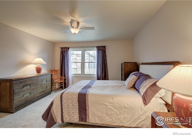 carpeted bedroom with a ceiling fan