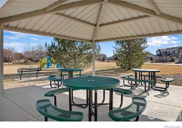 view of home's community featuring playground community and a gazebo