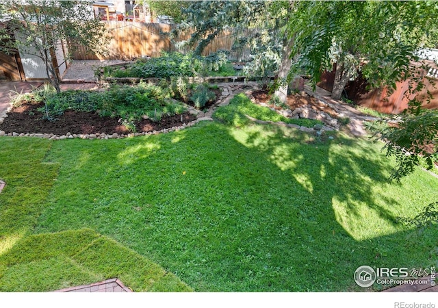 view of yard with fence