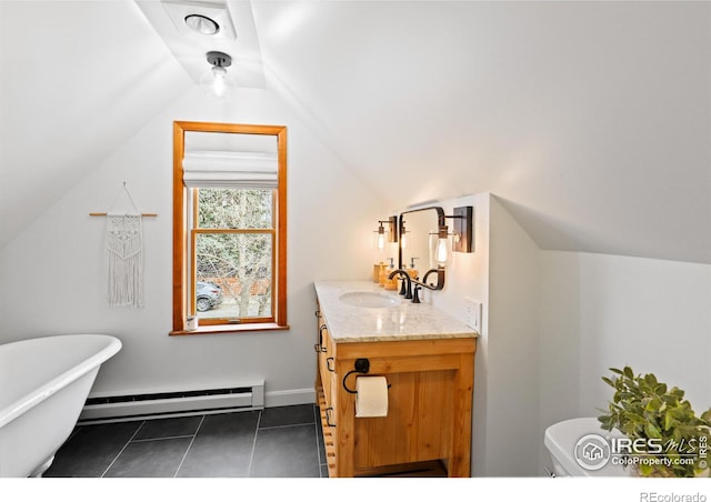 bathroom featuring lofted ceiling, a soaking tub, a baseboard radiator, tile patterned flooring, and vanity