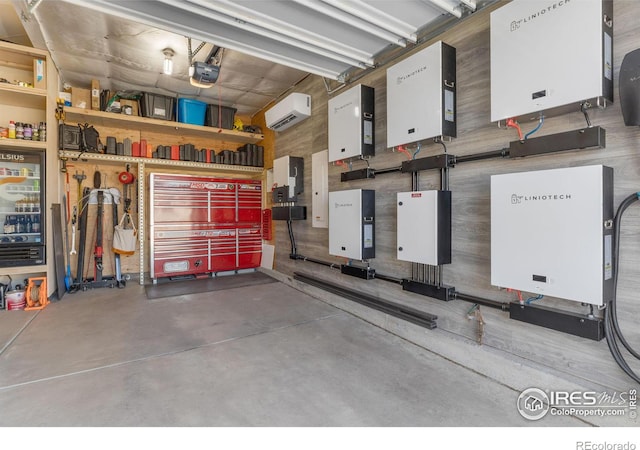 garage with a garage door opener and a wall mounted AC