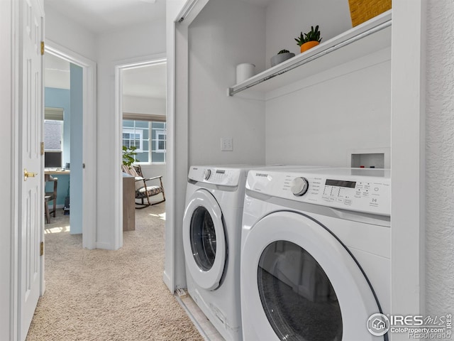 laundry room with laundry area and washer and dryer