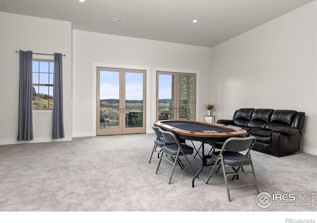 dining room featuring carpet flooring, recessed lighting, visible vents, and french doors