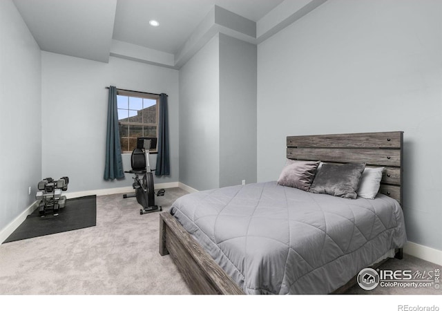 bedroom featuring baseboards, carpet flooring, and recessed lighting