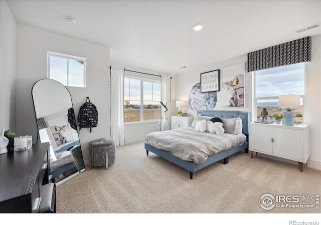 bedroom with recessed lighting, baseboards, visible vents, and carpet flooring