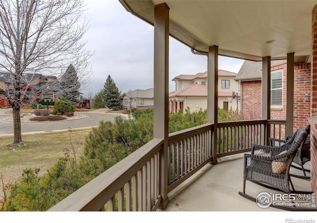 balcony featuring a residential view