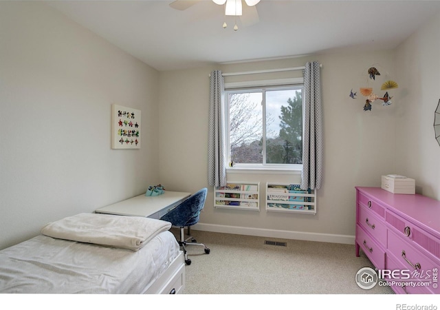 bedroom with carpet, visible vents, ceiling fan, and baseboards